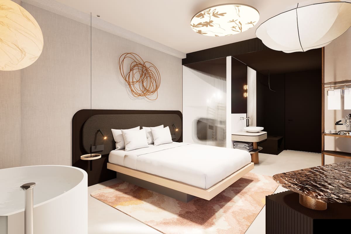 A modern bedroom with a bed, bedside tables, a large mirror, and a unique ceiling light fixture.