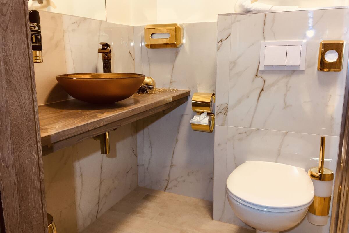 single room | bathroom | shower, hair dryer, towels, soap