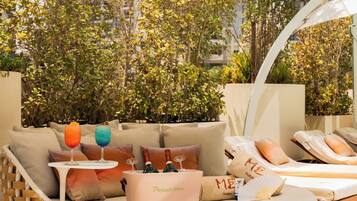 Outdoor pool, open 8:30 AM to 6:30 PM, pool umbrellas, pool loungers