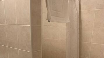 Shower, hair dryer, towels, toilet paper