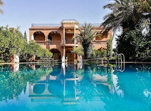 Outdoor pool, pool umbrellas, pool loungers