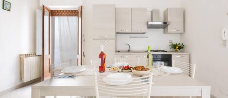 Standard Apartment, 2 Bedrooms | Private kitchen | Full-size fridge, oven, stovetop, cookware/dishes/utensils