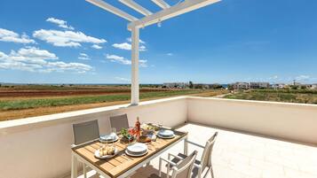 Luksus-penthouselejlighed - 1 soveværelse (Suite Attico con Jacuzzi) | Terrasse/gårdhave