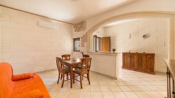 Standard House, 2 Bedrooms | Living area | Flat-screen TV