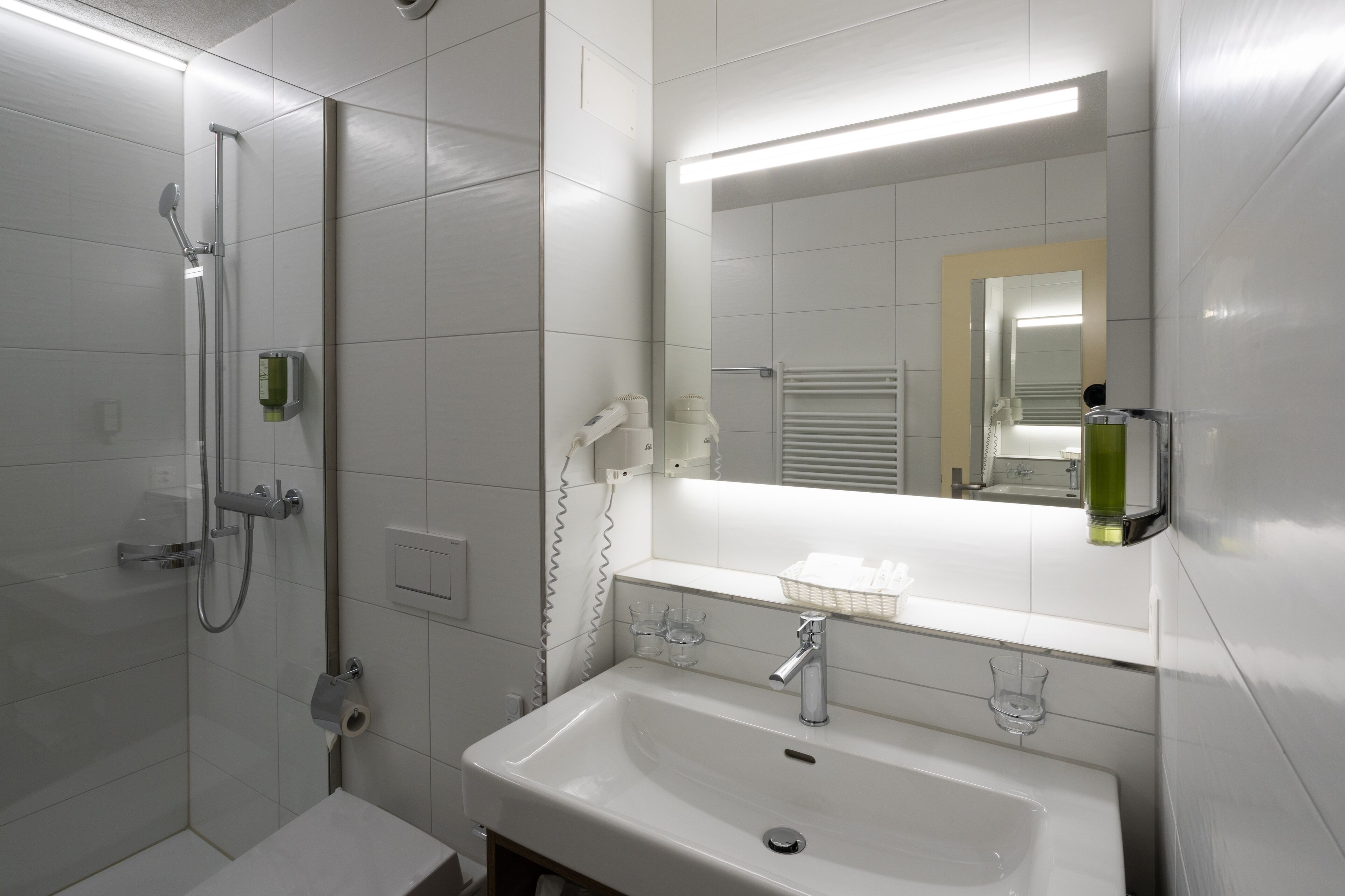 shower, free toiletries, hair dryer, slippers