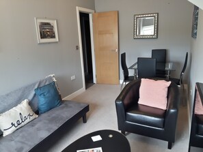 Apartment, 1 Bedroom | Living area | Flat-screen TV