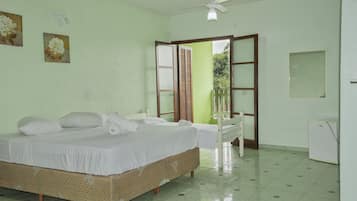 Quarto standard | Frigobar, Wi-Fi de cortesia, roupa de cama