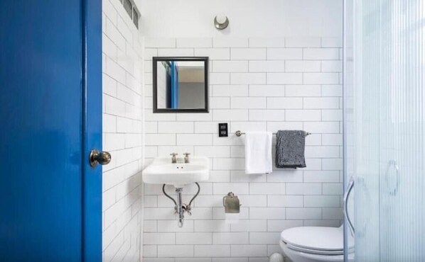 Shower, towels, toilet paper