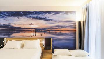 Habitación estándar, 1 cama matrimonial y sofá cama | 1 habitación, caja de seguridad en la habitación y insonorización