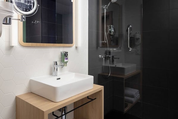 Shower, eco-friendly toiletries, hair dryer, towels