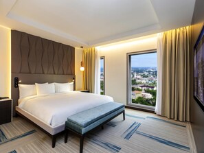 Premium bedding, down duvets, minibar, in-room safe