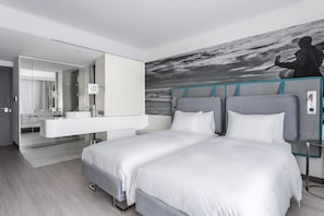 Eco-friendly toiletries, hair dryer, bathrobes, towels
