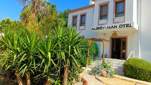 A two-story building with a sign reading "ALİBEY-HAN OTEL". - Alibeyhan Otel (Ayvalik)