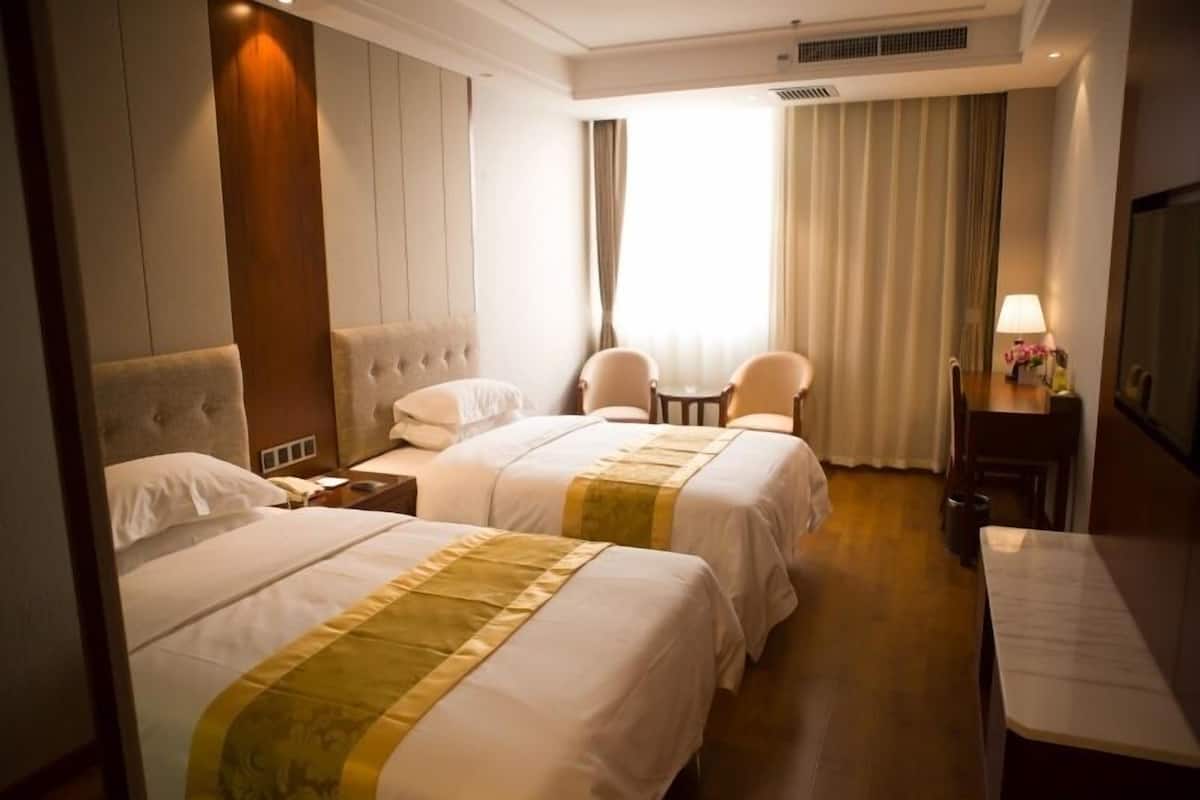 Habitación superior con 2 camas individuales | Wifi gratis