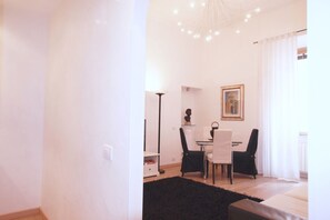 Departamento, 1 habitación | Área de sala de estar | Televisión de pantalla plana 