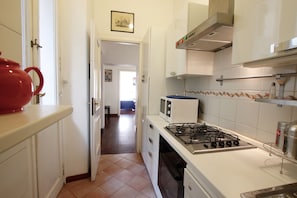 Apartment, 2 Bedrooms | Private kitchen | Full-size fridge, microwave, oven, stovetop - Monticelli (Rome)