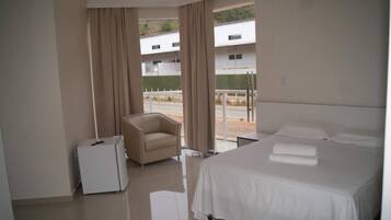 Minibar, desk, blackout drapes, iron/ironing board