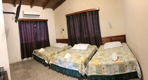 Family Triple Room | Down comforters, iron/ironing board, free WiFi, bed sheets - Hotel Pasabien (Rio Hondo)