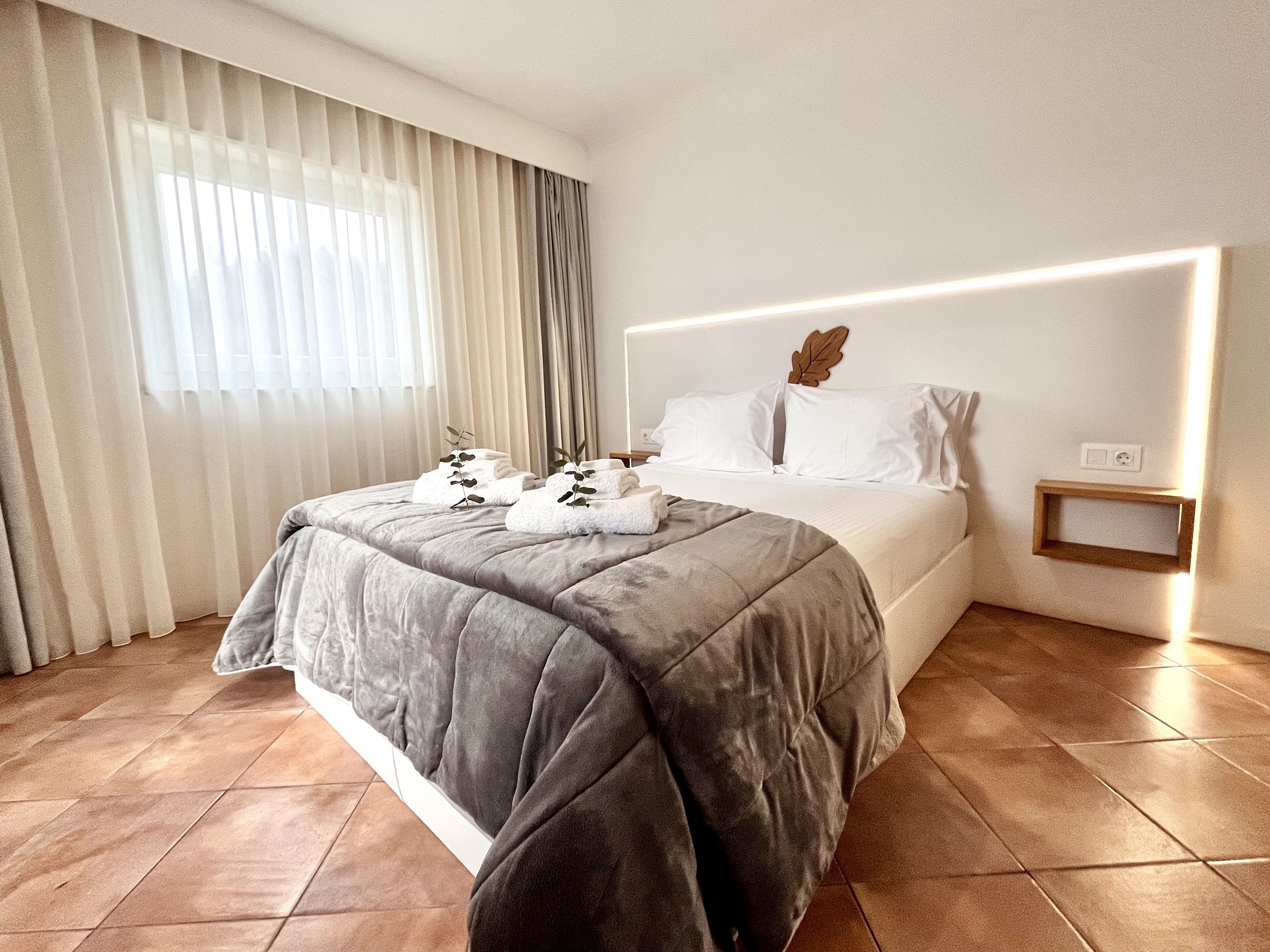 Habitación Deluxe | Insonorización, wifi gratis y ropa de cama 