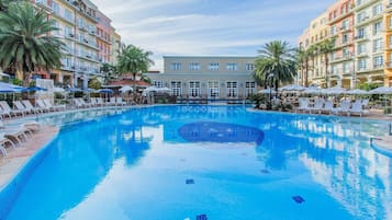 Outdoor pool, pool umbrellas, pool loungers