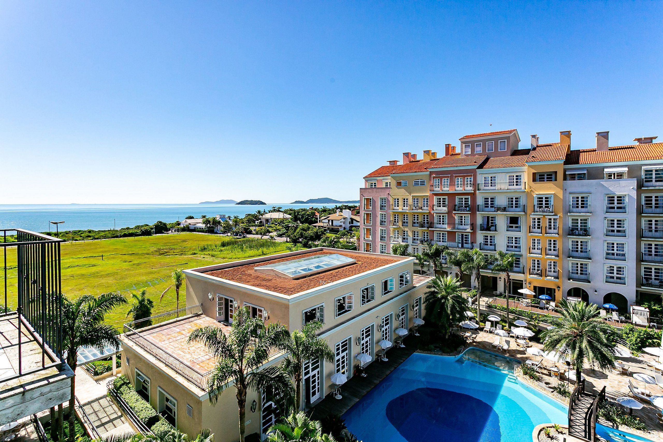 Basic Apartment | Pool | Outdoor pool, pool umbrellas, sun loungers
