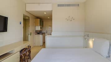 Apartamento básico | Quartos à prova de som, ferros/tábuas de passar roupa, Wi-Fi de cortesia