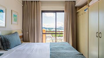 Apartemen Basic | Kedap suara, setrika/meja setrika, Wi-Fi gratis, dan seprai linen