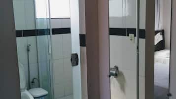 Shower, towels, soap, toilet paper