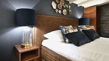 Kamar Double Deluks (Garden Room) | 1 kamar tidur, seprai premium, minibar gratis, dan brankas