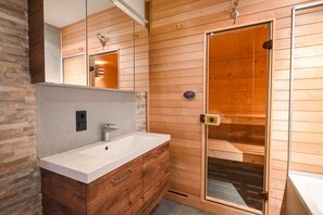 Bathtub, hair dryer, towels