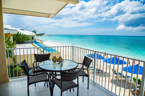 Unique Oceanfront Condo on 7-Mile-Beach. Private Balcony. Cayman Reef Resort #30