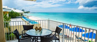 Unique Oceanfront Condo on 7-Mile-Beach. Private Balcony. Cayman Reef Resort #30