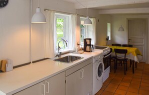 Fridge, stovetop, coffee/tea maker, cookware/dishes/utensils