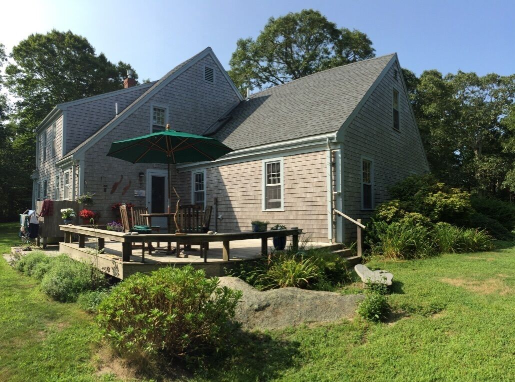 Secluded house in the woods with deck, streamside firepit, Vincent Beach nearby