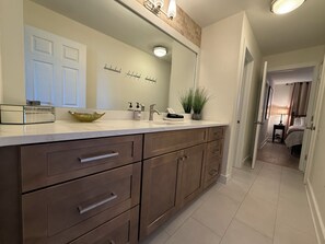 Combined shower/bathtub, hair dryer, towels, soap - Spacious Riverfront Condo • 1 Mile to Broadway • Free Covered Parking (Nashville)