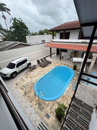 Terraced house with pool near the sea