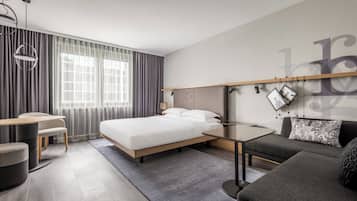 デラックス ルーム キングベッド 1 台 禁煙 | 1 室のベッドルーム、セーフティボックス (室内)、デスク、ノートパソコン用作業スペース