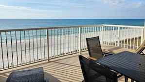 A balcony with a view of the beach and ocean. - Sandy Key 416:  2 BR / 2BA Gulf Front Condo in Perdido Key, FL.  Sleeps 6 (Perdido Key)