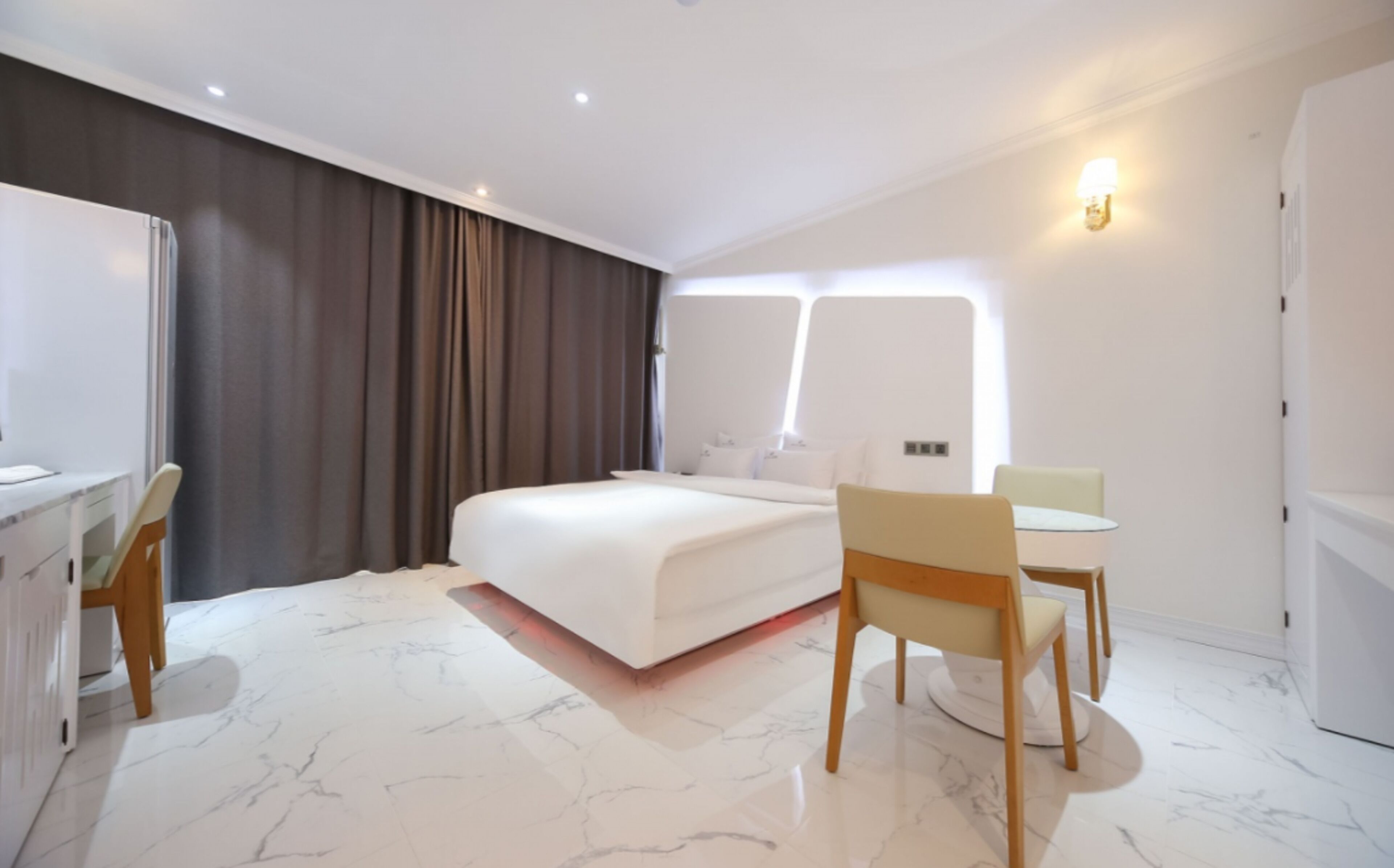 deluxe room | blackout curtains, soundproofing, free wifi, bed sheets