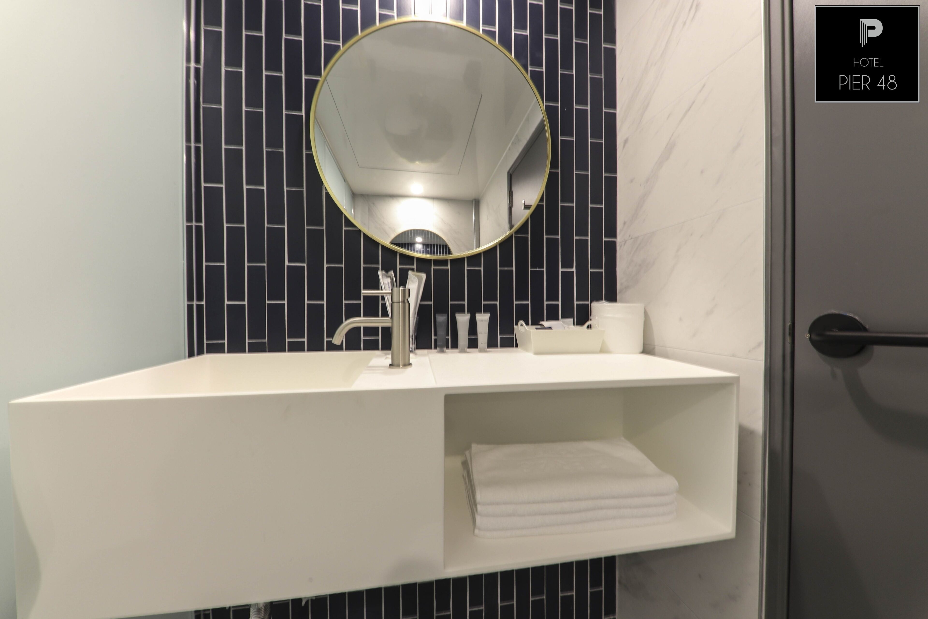 premium room | bathroom | free toiletries, hair dryer, slippers, towels