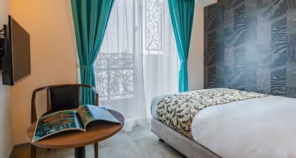 Mr.KINJO Miki24 in front of Makishi Station