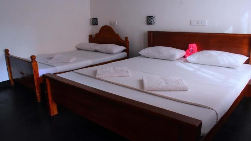 Kahden hengen perhehuone | Työpöytä, silitysrauta/-lauta, ilmainen Wi-Fi, vuodevaatteet