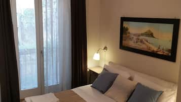 Blackout drapes, free WiFi, bed sheets