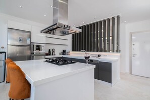 Fridge, microwave, oven, stovetop - Villa Eskiz - stunning 5 bedroom villa with unobstructed views and infinity pool (Kalkan)