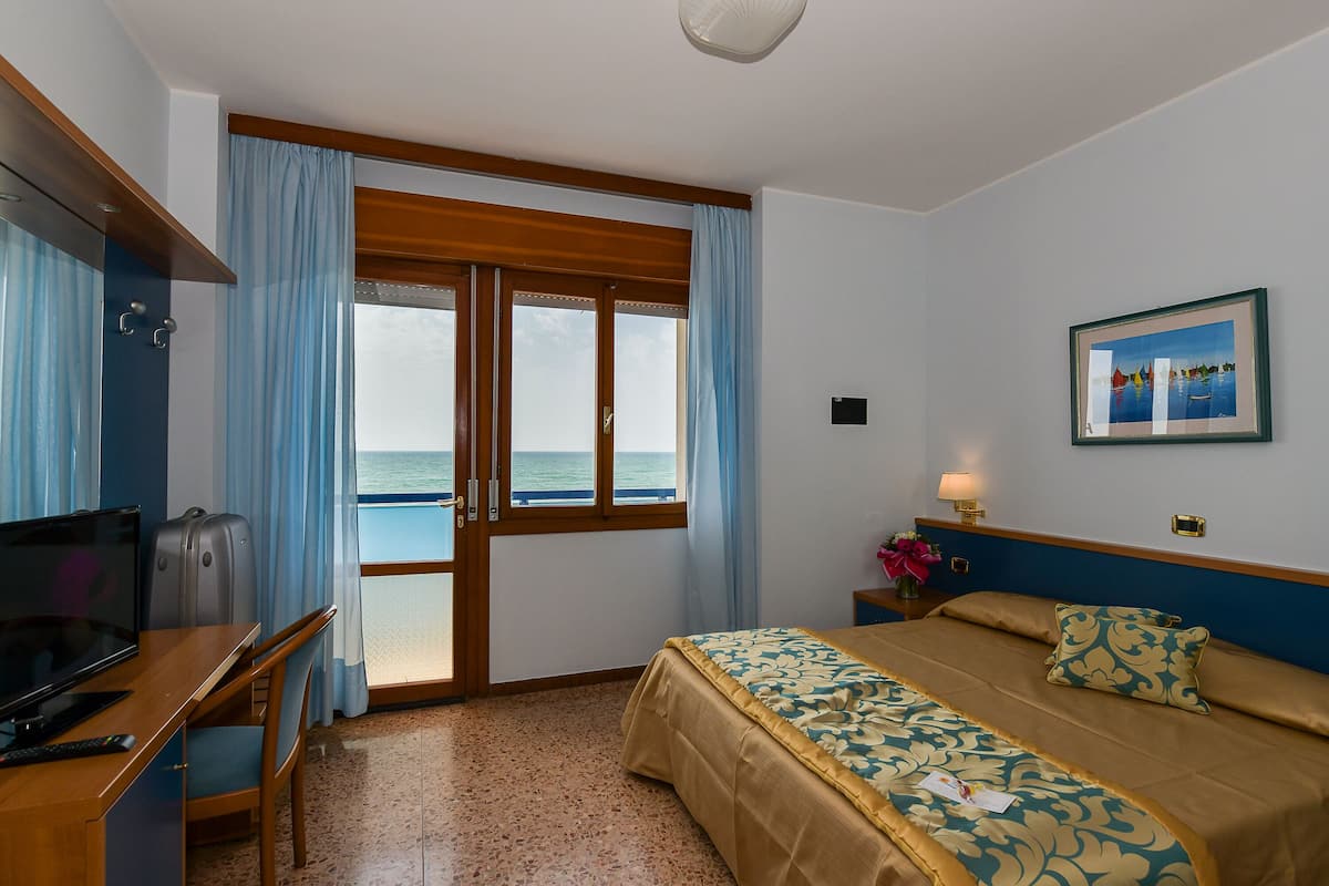 Double or Twin Room, Sea View | In-room safe, desk, free WiFi, bed sheets