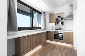 Panoramic Penthouse, 1 Bedroom, Balcony, City View | Private kitchen | Fridge, microwave, oven, stovetop - Penthouse Level 8 Nilie Hospitality MGMT (Thessaloniki)