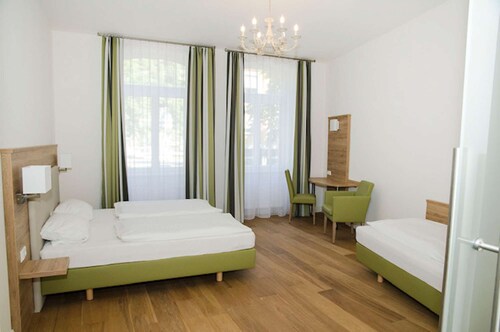 Perkeo Apartments: Junior-, Familiensuite | Heidelberg-Altstadt