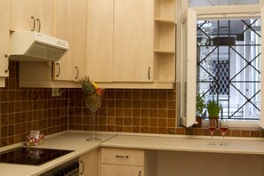 Apartment, 1 Bedroom | Private kitchen | Fridge, microwave, oven, stovetop - Be a Budapester (Budapest)