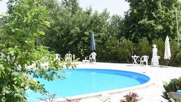 Indoor pool, seasonal outdoor pool, pool umbrellas, pool loungers