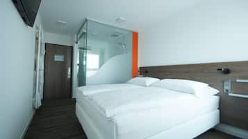 Hypo-allergenic bedding, desk, blackout drapes, soundproofing